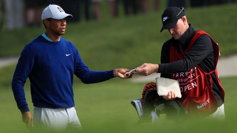 Tiger Woods und sein Caddie Jo...